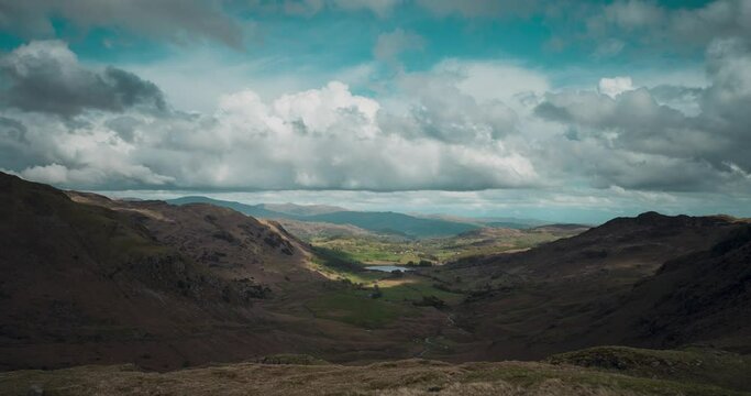 Time lapse of clouds over  Lake District National Park landscape