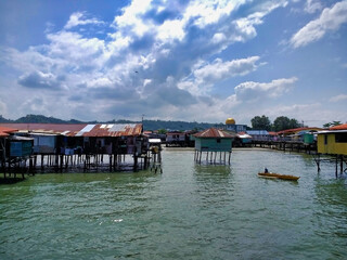Stilt villages in slums. Houses on the water in Kota Kinabalu. Malaysia. Borneo Island. Sabah....