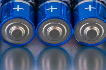 Row of alkaline batteries close-up