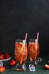 Strawberry lemonade with ice. Cold drink with strawberries.