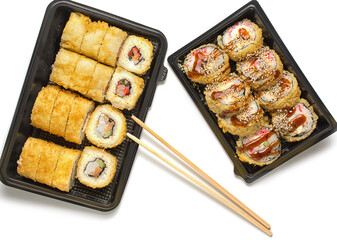 sushi set in an open black plastic bag with two chopsticks. White background