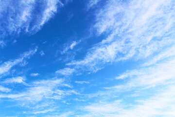 Beautiful blue sky and white cirrocumulus clouds. Background. Scenery. Texture.
