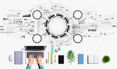 Tech circle with person using a laptop