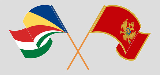 Crossed and waving flags of Seychelles and Montenegro