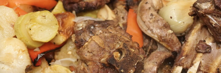 Traditional Stew From International Cuisine In Large Pot Coked From Meat And Vegetables With Herbs, Top View, Isolated. Meat And Vegetables Stewed In Bowl With Roasted  Vegetables Closeup View.