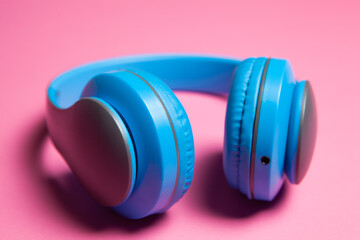 Obraz na płótnie Canvas big headphones on a pink background