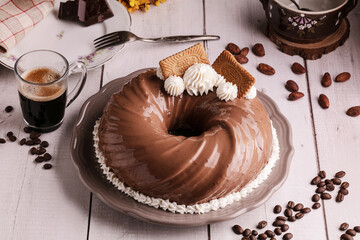 Chocolate and coffee cake with a cup of coffee