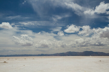 Industrial salt extraction opencast mining. View of the natural salt flat and salt mine under a beautiful sky in Salinas Grandes, Jujuy, Argentina.