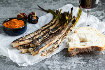 grilled Calcots onions traditional Catalan winter dish