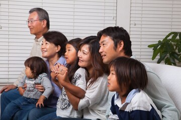Japanese 3rd generation family relaxing in the living room