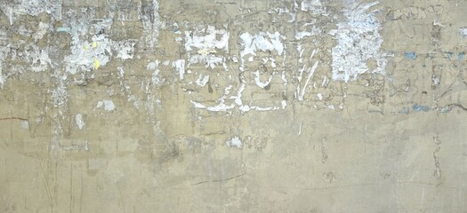 Scratched Advertising On Grunge Wall Panoramic Rough Background. Exposed Weathered Urban Wall with...