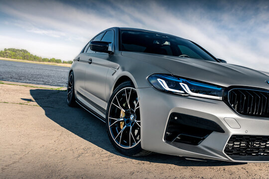 New BMW M5 F90 Competition on the background of the river. Kherson, Ukraine - May 2021.