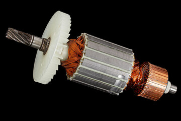 Rotor or of anchor electric motor closeup, isolated on black background, with clipping path
