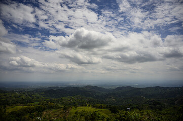 Hanging clouds natural blue sky landscape mountain