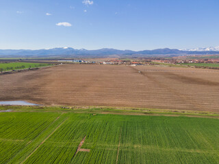 Fototapeta na wymiar Aerial Spring landscape of Rural Land near town of Hisarya, Bulgaria