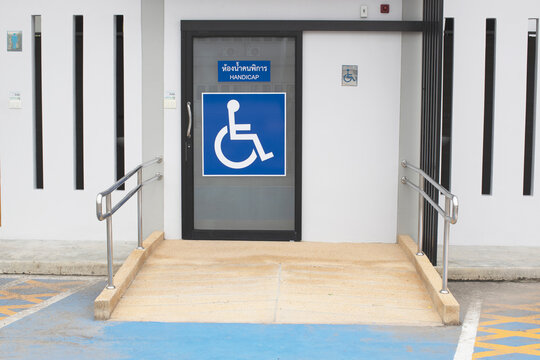 facility provide for handicap toilet such as Ramp, handrail, buzzer, warning light in case of handicap need help