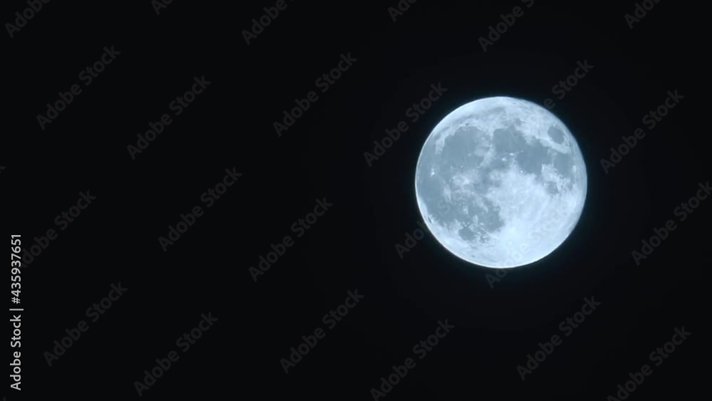 Wall mural super moon in dark sky. full moon at night with copy space from left.