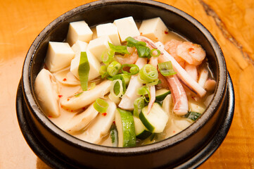 Tofu and seafood hotpot at a Korean restaurant.