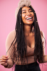 Happy Biracial Woman Posing In Front Of Pink Background