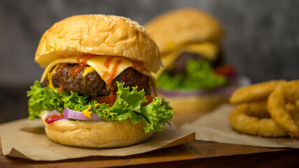 Close up shot of ready to eat homemade beef hamburger with fresh vegetables