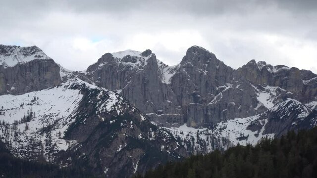 Huge mountain peaks covered with snow during sunset in early spring. Steinberg am Rofan view of Tyrolean Alps.