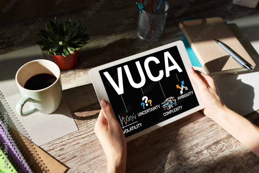 Poster vuca world concept on screen. volatility, uncertainty, complexity, ambiguity.