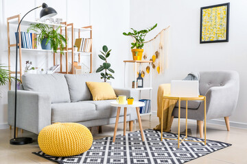 Interior of modern living room with shelf units and sofa