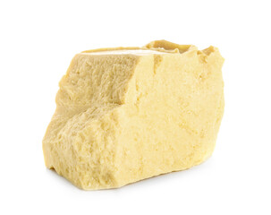 Piece of cocoa butter on white background