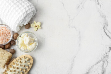 Spa set with shea butter on light background