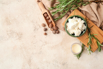 Composition with shea butter and herbs on light background