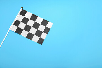 Racing flag on color background