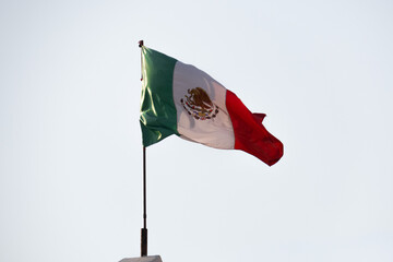 flag of the country mexico waving on the flagpole, concept flag of mexico
