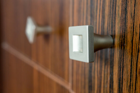 Closeup Shot Of Metal Shelf Handles