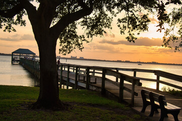 Fototapeta na wymiar Fishing at sunset in Indialantic Florida on the river