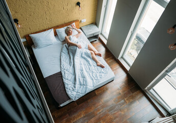 Sleeping woman in hotel 