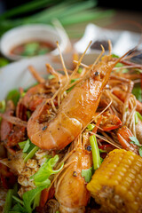 Spicy seafood bucket, Cook spicy shrimp mixed seafood Thai style, Thai foods.;