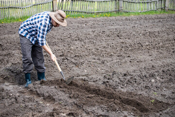 make furrows for planting