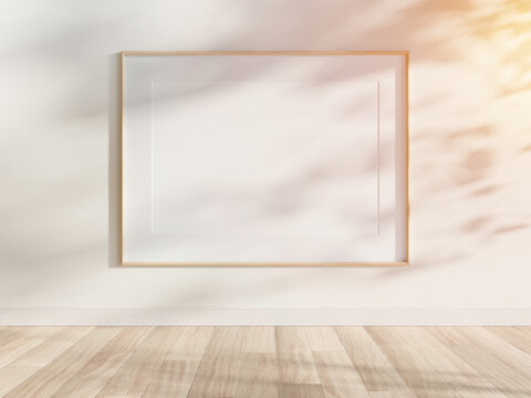 Wooden frame hanging in bright interior mockup. Template of a picture framed on a wall 3D rendering