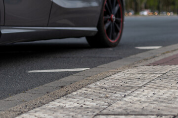 Danger in road traffic for blind people and disabled people is minimized by floor guidance systems for blind people to hint at dangers in street traffic for safety and security in the city streets