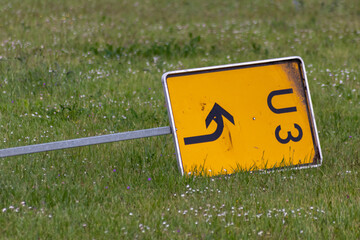 Yellow traffic sign for redirection on urban streets forces navigation system to calculate a new...