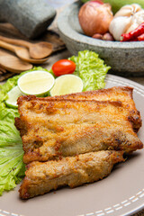 Delicious and crispy Samcan Goreng or Fried Pork Belly from medan - north sumatra