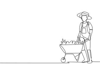 Single one line drawing of young male farmer standing beside the wheelbarrow trolley filled with fruits. Farming challenge minimalist concept. Continuous line draw design graphic vector illustration