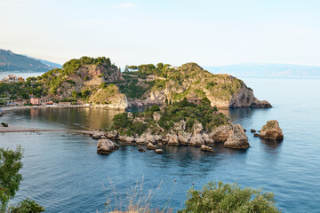 Isola Bella island near Taormina, Sicily, Italy Beautiful small island surrounded by azure waters of the Ionian Sea. Beauty in Sicily as a tourist attraction. Season on mediterranean sea.