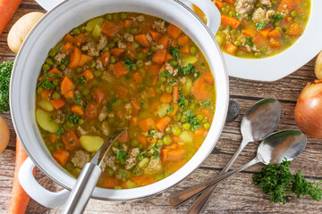 A pot of vegetables soup with minced meat