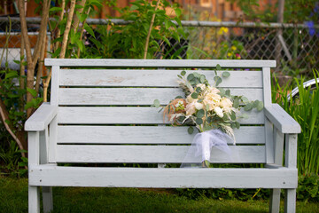 Wedding Bouquet of Roses on the Bench