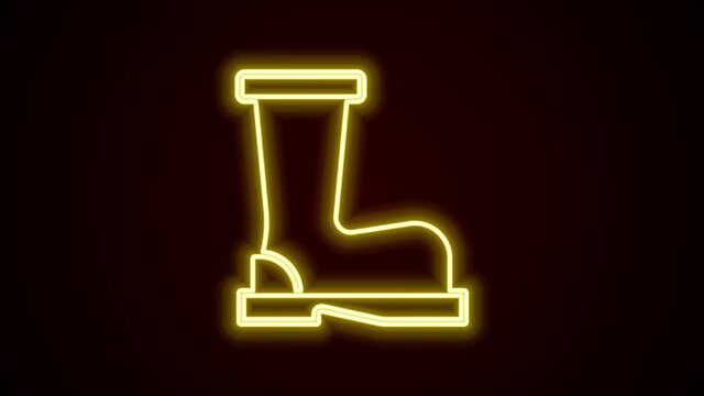 Glowing neon line Fire boots icon isolated on black background. 4K Video motion graphic animation