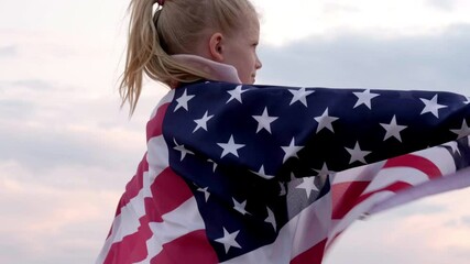 4k. Back view Blonde girl waving national USA flag outdoors over sunset sky at summer on beach - american flag, country, patriotism, independence memorial day 4th July. - Powered by Adobe