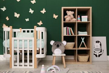 Beautiful baby room interior with comfortable crib