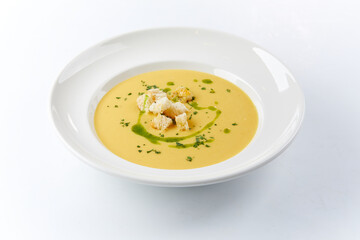cream soup in the white plate