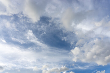 Fototapeta premium Beautiful white fluffy clouds on vivid blue sky in day light
